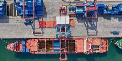 aerial-photo-of-cargo-ship-near-intermodal-containers